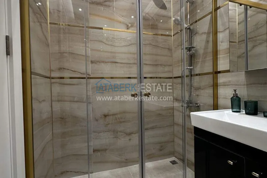 Purchase 2+1 penthouse duplex with sea view in the center of Mahmutlar - installments of up to 12 months are possible 14