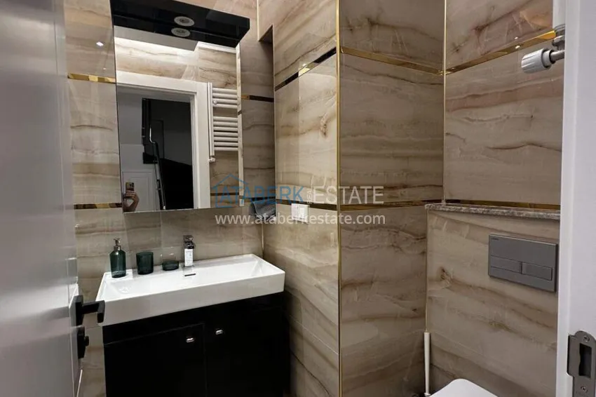 Purchase 2+1 penthouse duplex with sea view in the center of Mahmutlar - installments of up to 12 months are possible 15