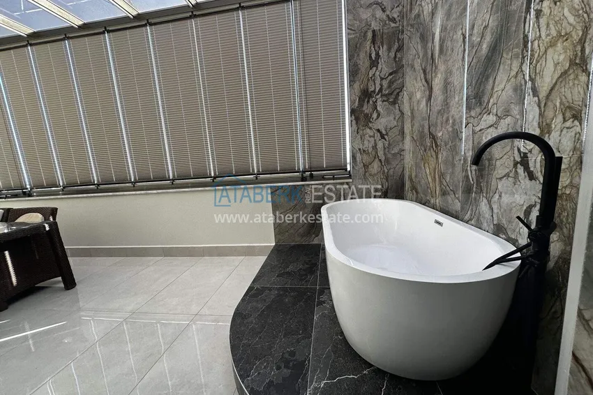 Purchase 2+1 penthouse duplex with sea view in the center of Mahmutlar - installments of up to 12 months are possible 22