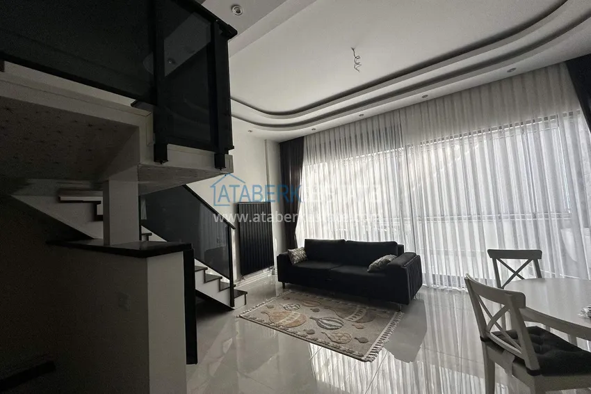 Purchase 2+1 penthouse duplex with sea view in the center of Mahmutlar - installments of up to 12 months are possible 4