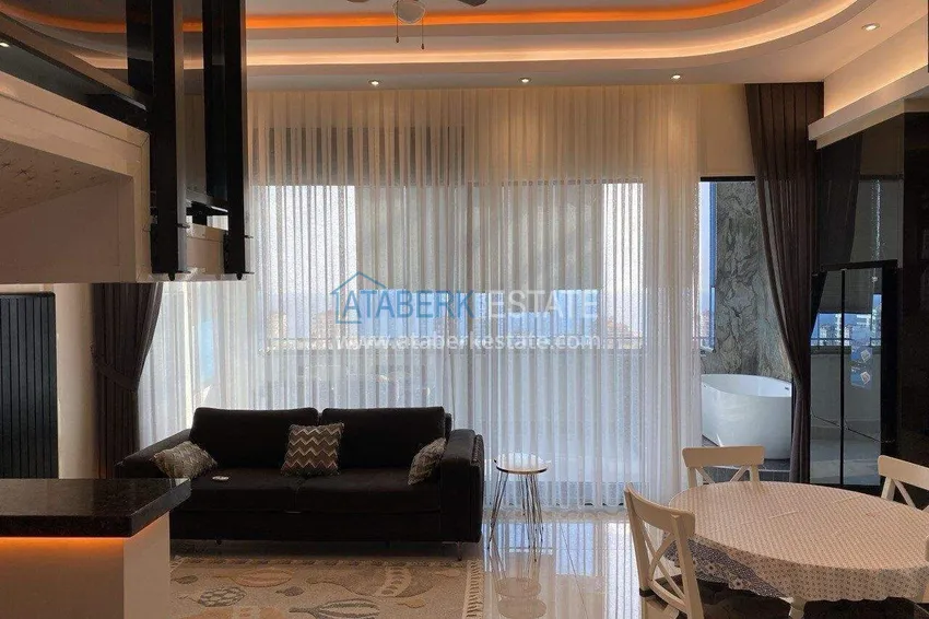 Purchase 2+1 penthouse duplex with sea view in the center of Mahmutlar - installments of up to 12 months are possible 6