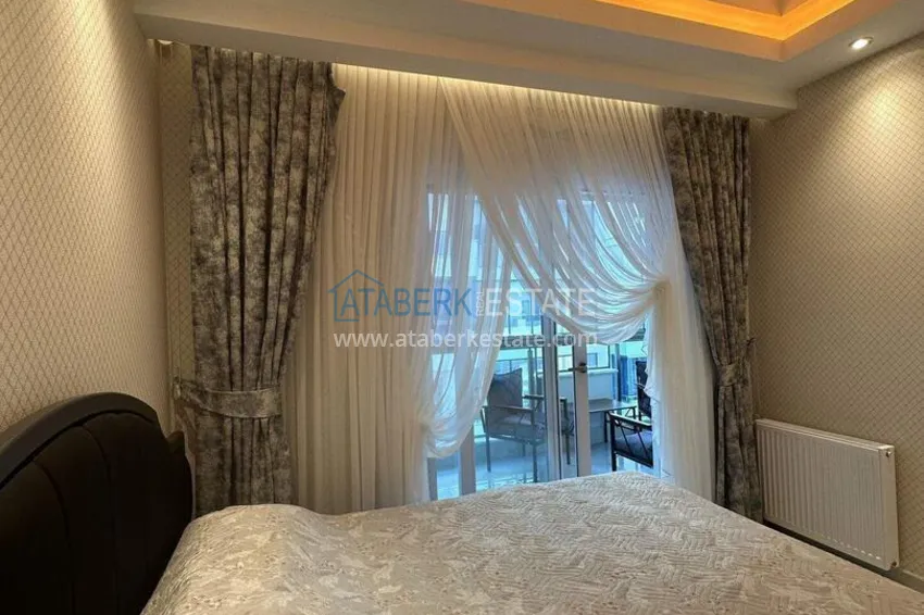 Purchase 1+1 apartment 70 m² in the center of Mahmutlar — furnished, glazed balcony, installments up to 1 year 11