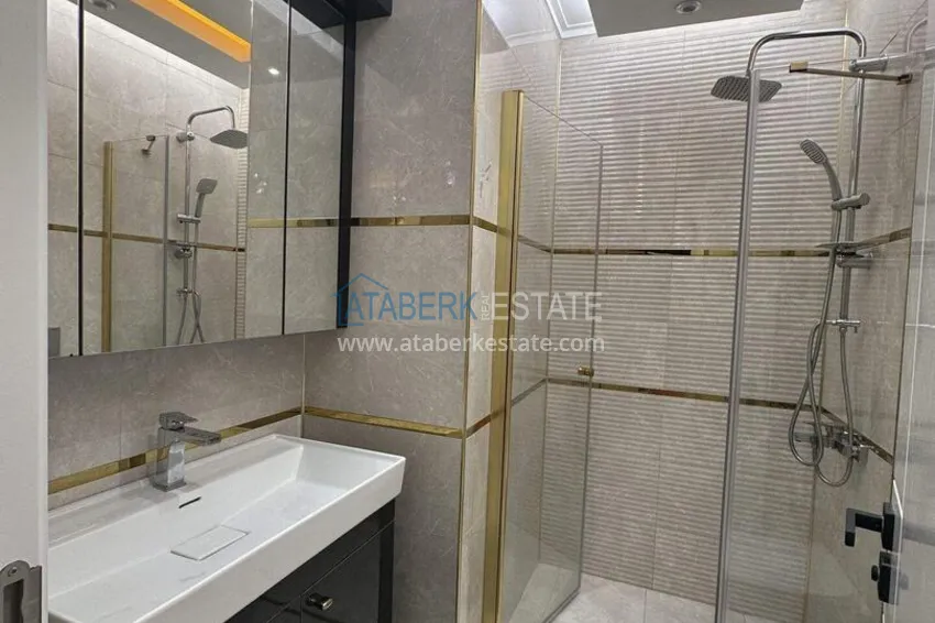 Purchase 1+1 apartment 70 m² in the center of Mahmutlar — furnished, glazed balcony, installments up to 1 year 12