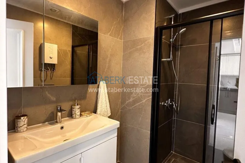 Purchase 1+1 apartment in the center of Alanya - furnished and with sea views, installments are available 13