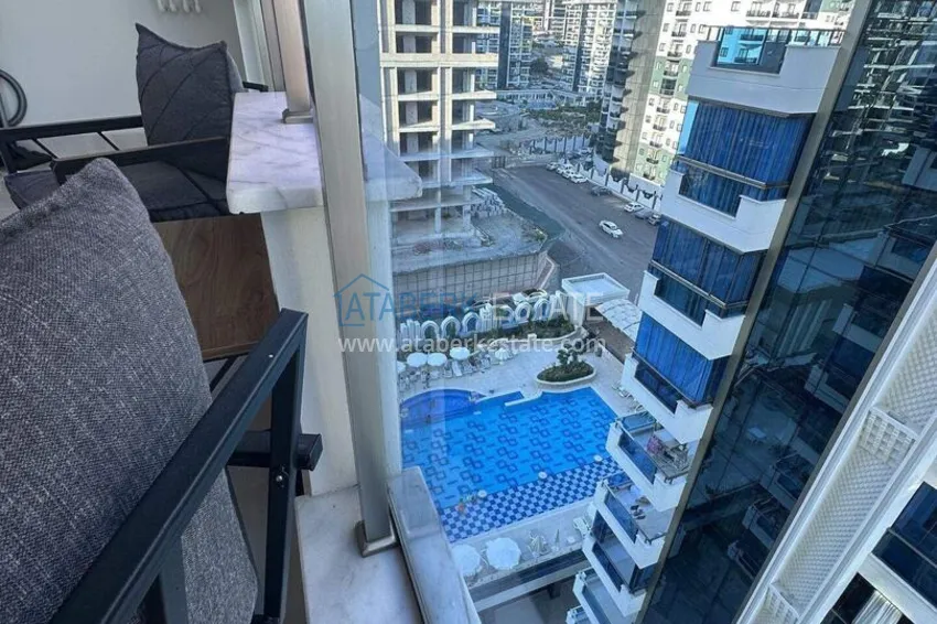 Purchase 1+1 apartment 70 m² in the center of Mahmutlar — furnished, glazed balcony, installments up to 1 year 16