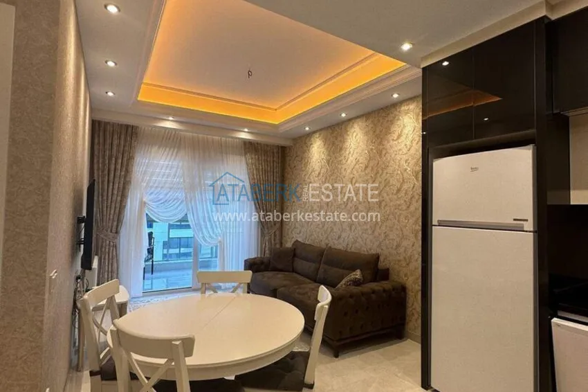 Purchase 1+1 apartment 70 m² in the center of Mahmutlar — furnished, glazed balcony, installments up to 1 year 6