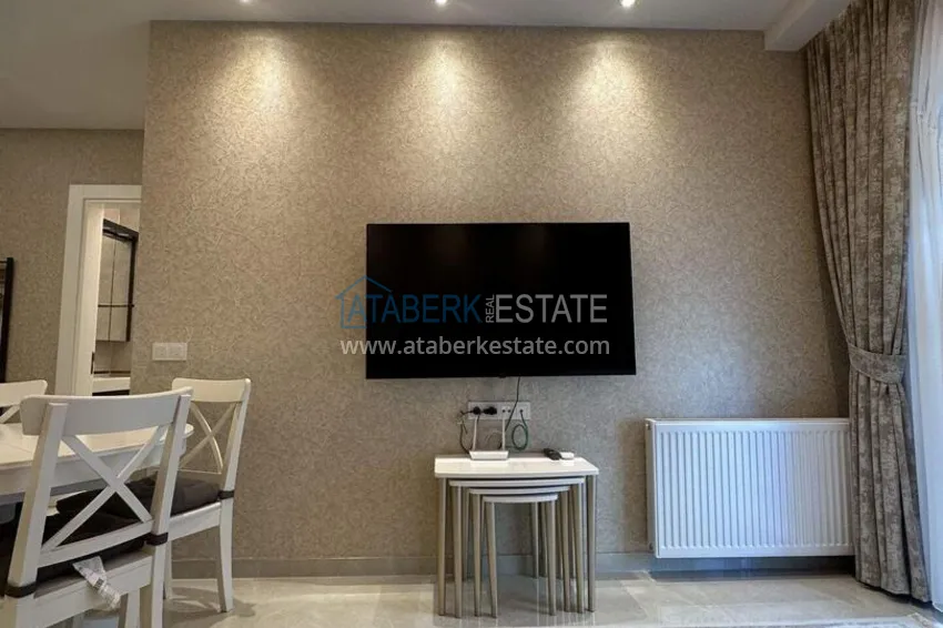 Purchase 1+1 apartment 70 m² in the center of Mahmutlar — furnished, glazed balcony, installments up to 1 year 8