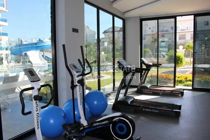 1+1 apartment with furniture and sea view in Tosmur, Alanya   24 