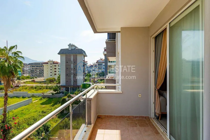 Purchase Apartment 1+1 in the Kestel area on the first line — furnished and with sea views 13