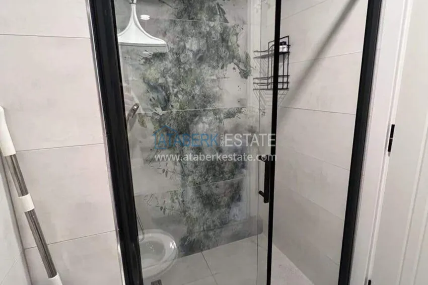 Purchase 1+1 apartment for rent in Mahmutlar — furnished and with views of the A40 mountains 10
