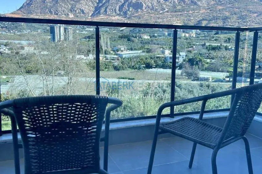 Purchase 1+1 apartment for rent in Mahmutlar — furnished and with views of the A40 mountains 11