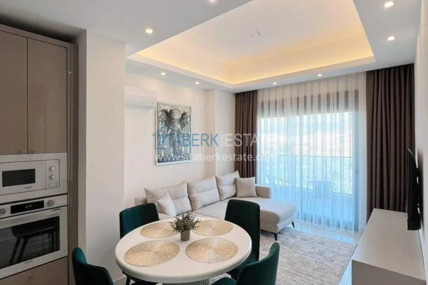 Purchase 1+1 apartment for rent in Mahmutlar — furnished and with views of the A40 mountains 1