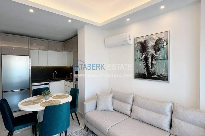 Purchase 1+1 apartment for rent in Mahmutlar — furnished and with views of the A40 mountains 4