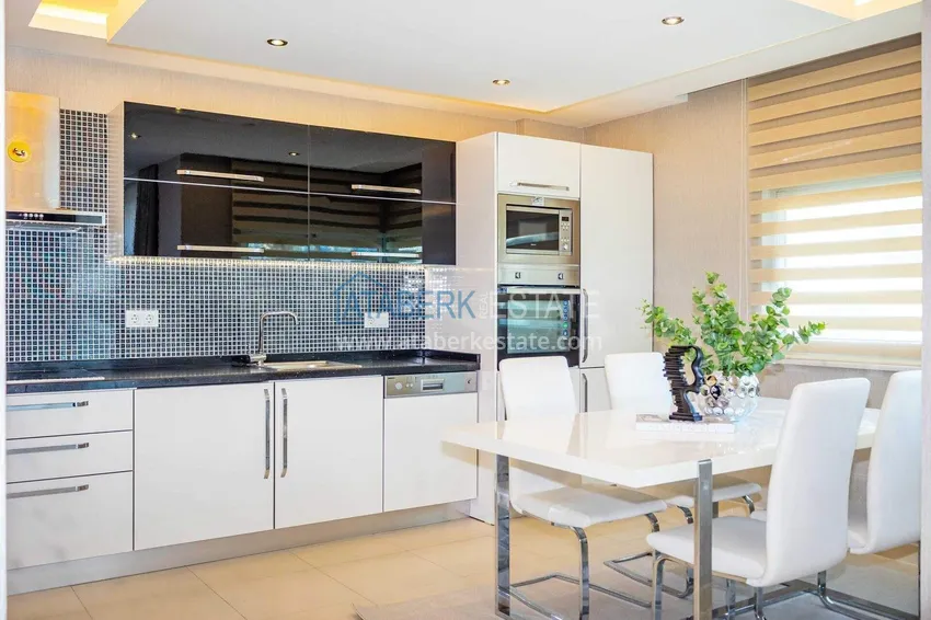 Purchase 2+1 garden duplex in Kestel on the beachfront - with new furniture and sea views 18
