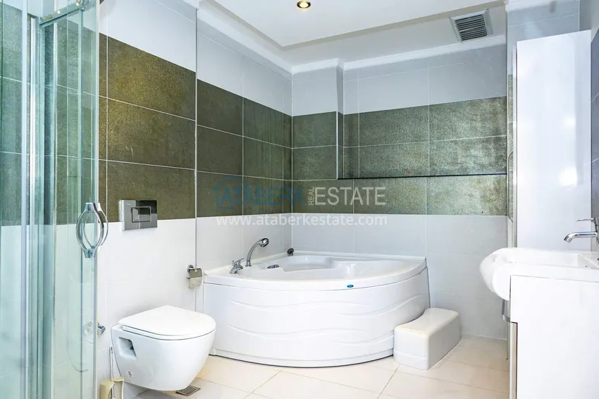 Purchase 2+1 garden duplex in Kestel on the beachfront - with new furniture and sea views 33