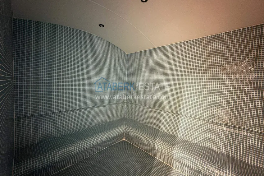 Finished two-bedroom apartment in a complex under completion in Mahmutlar 14 