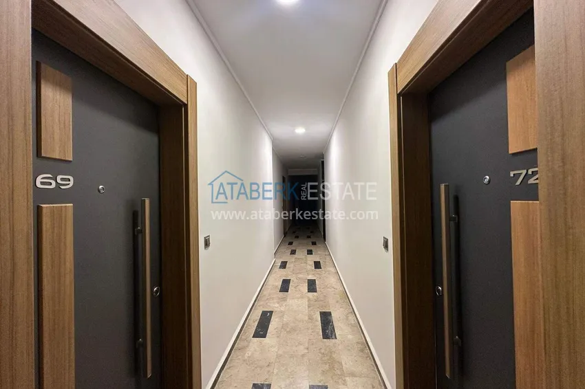Finished two-bedroom apartment in a complex under completion in Mahmutlar 16 