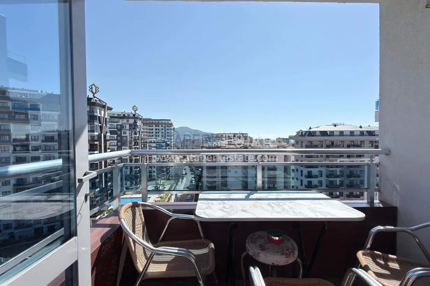 Purchase Apartment 1+1 in the center of Mahmutlar - on the 12th floor with furniture and mountain views 11