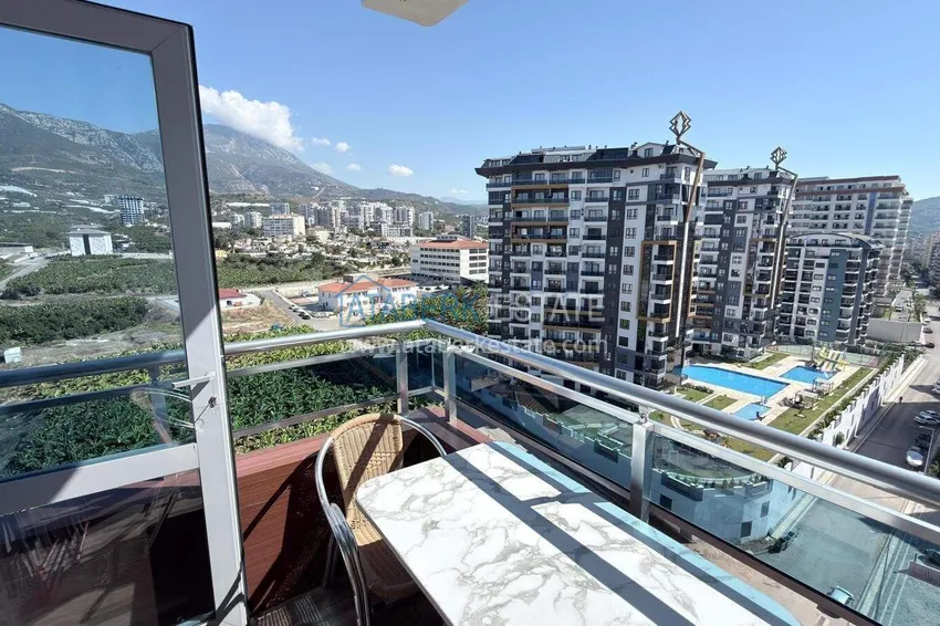Purchase Apartment 1+1 in the center of Mahmutlar - on the 12th floor with furniture and mountain views 13
