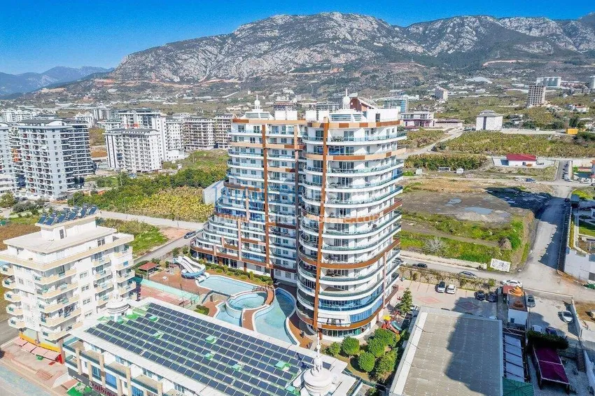 Apartment 1+1 in the center of Mahmutlar - on the 12th floor with furniture and mountain views 4