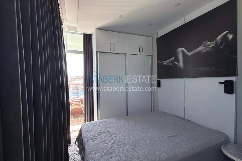 Purchase Apartment 1+1 in the center of Mahmutlar - on the 12th floor with furniture and mountain views 5