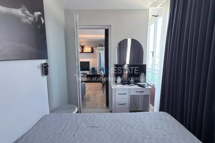 Purchase Apartment 1+1 in the center of Mahmutlar - on the 12th floor with furniture and mountain views 6