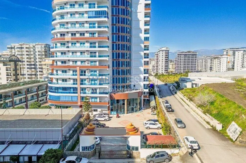 Apartment 1+1 in the center of Mahmutlar - on the 12th floor with furniture and mountain views 8