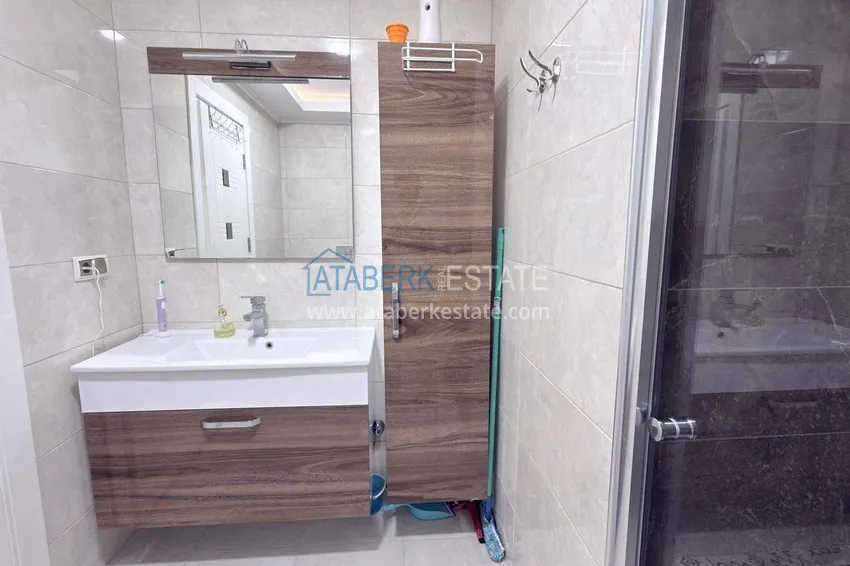 Purchase Apartment 1+1 in the center of Mahmutlar - on the 12th floor with furniture and mountain views 9