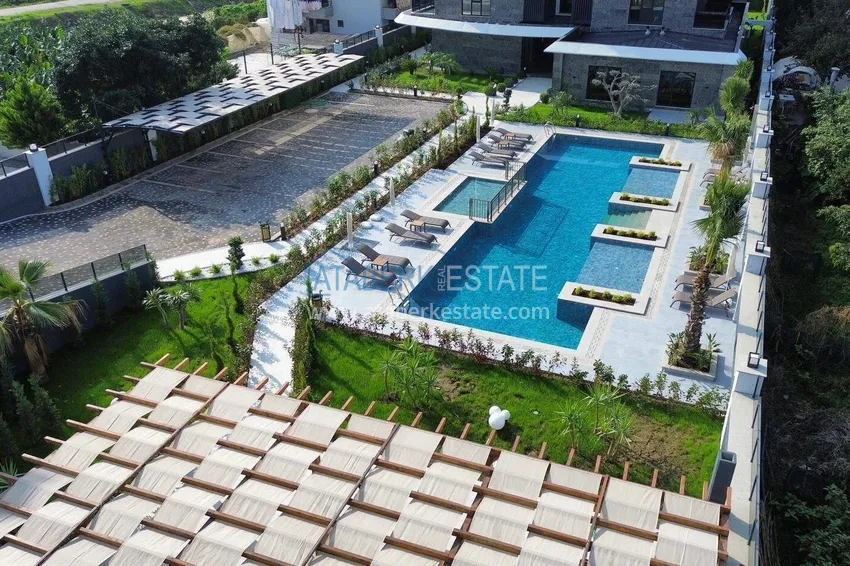 Apartment 1+1 with sea view on the first line in Kestel - 47 m², unfurnished, premium complex 11