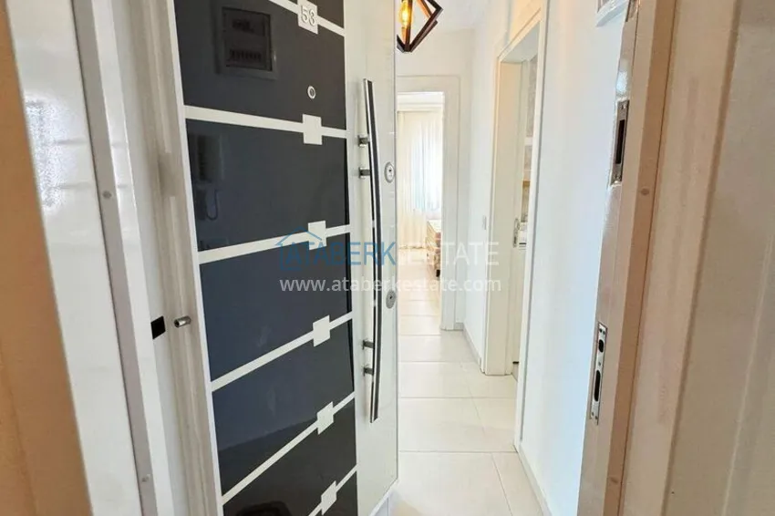 Purchase 1+1 apartment in Mahmutlar — new furniture, 70 m², glazed balcony, sea and mountain views 1
