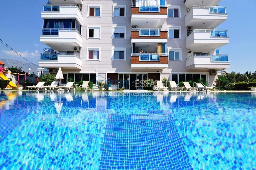 1+1 apartment in Mahmutlar — new furniture, 70 m², glazed balcony, sea and mountain views 11