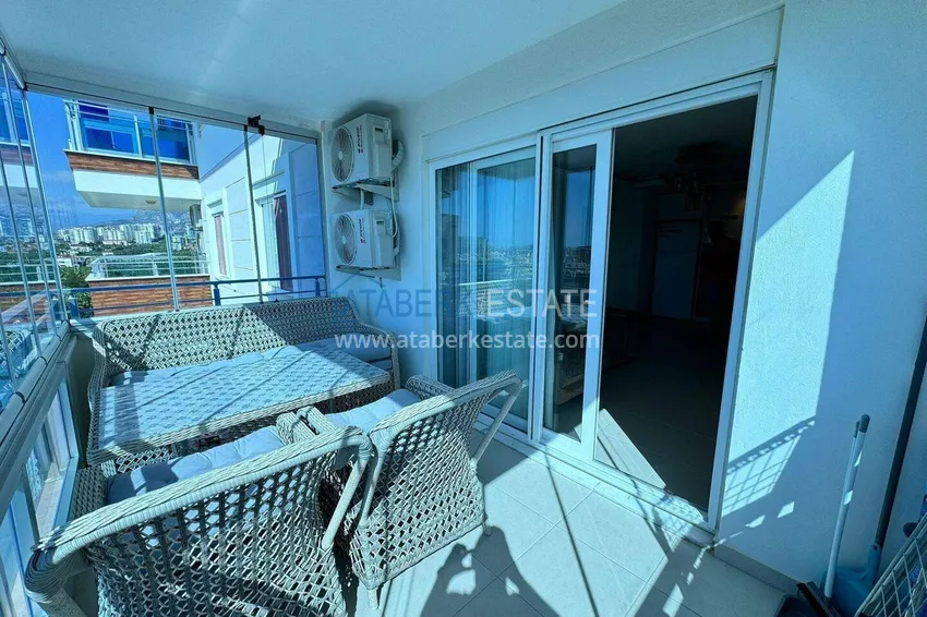 Purchase 1+1 apartment in Mahmutlar — new furniture, 70 m², glazed balcony, sea and mountain views 12