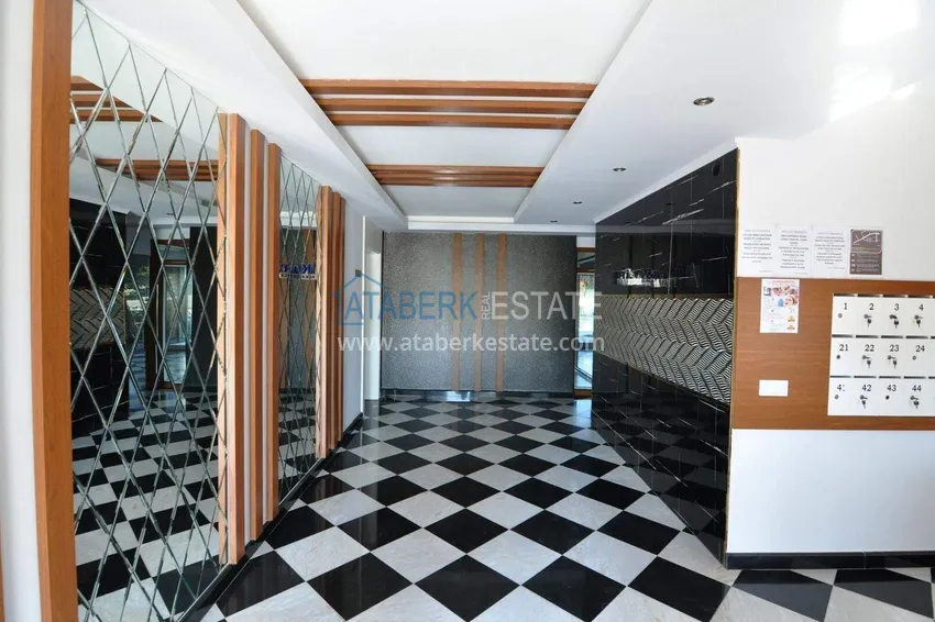 1+1 apartment in Mahmutlar — new furniture, 70 m², glazed balcony, sea and mountain views 21