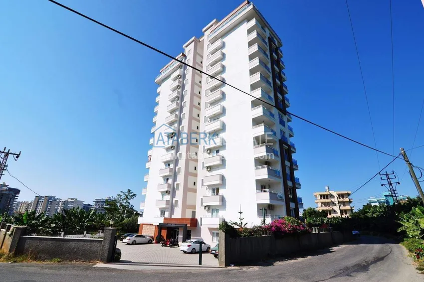 1+1 apartment in Mahmutlar — new furniture, 70 m², glazed balcony, sea and mountain views 3