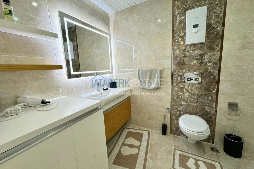 Purchase 1+1 apartment in Mahmutlar — new furniture, 70 m², glazed balcony, sea and mountain views 3