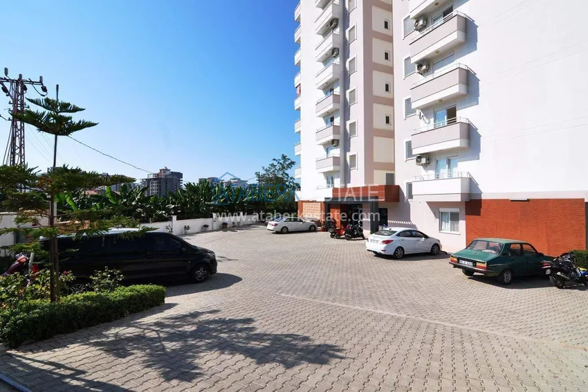 1+1 apartment in Mahmutlar — new furniture, 70 m², glazed balcony, sea and mountain views 4