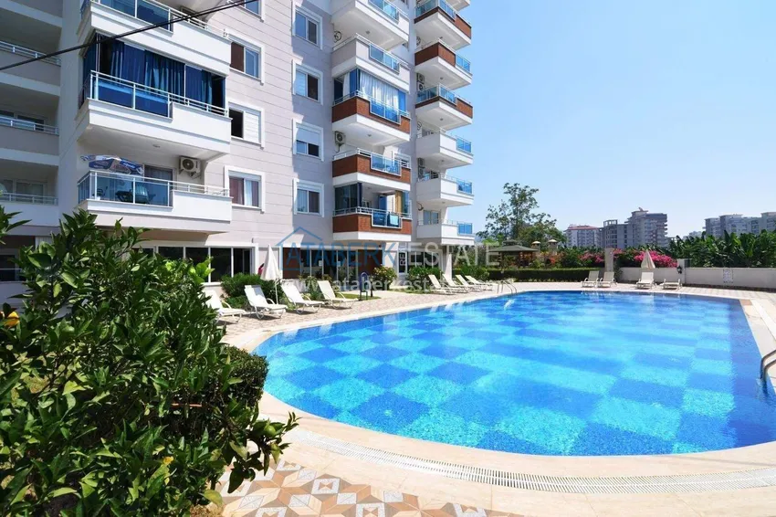1+1 apartment in Mahmutlar — new furniture, 70 m², glazed balcony, sea and mountain views 9