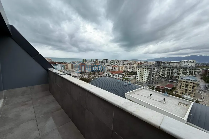 Purchase 2+1 duplex in Mahmutlar with furniture and sea and mountain views 13