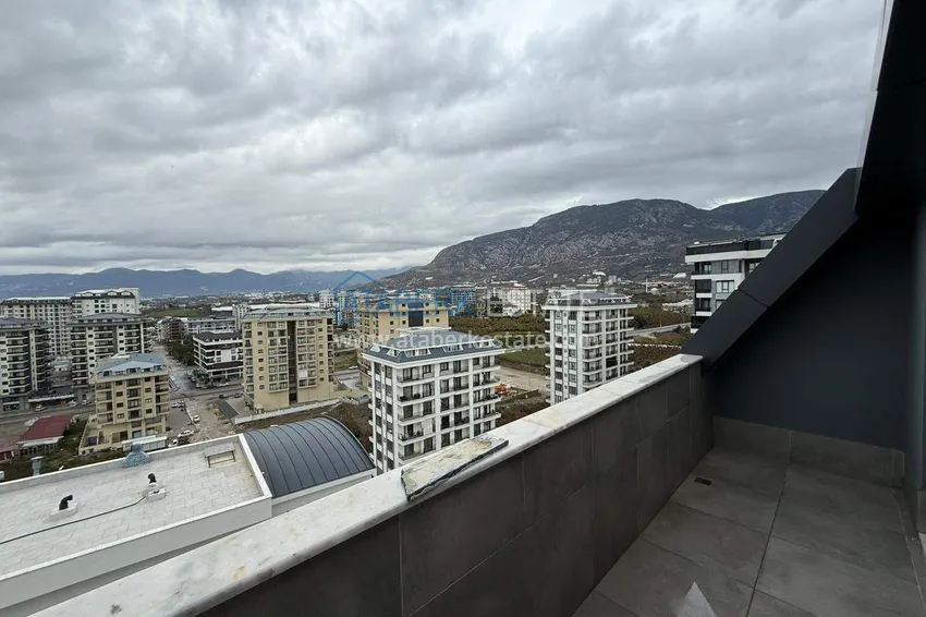 Purchase 2+1 duplex in Mahmutlar with furniture and sea and mountain views 14