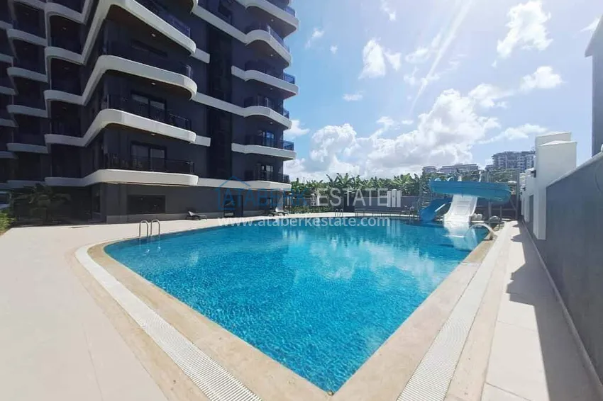 2+1 duplex in Mahmutlar with furniture and sea and mountain views 4