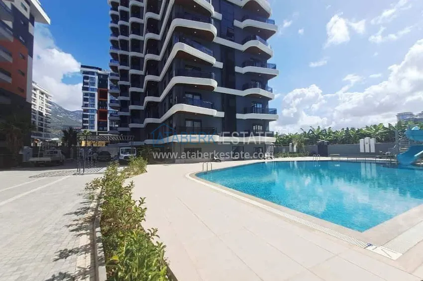 2+1 duplex in Mahmutlar with furniture and sea and mountain views 5