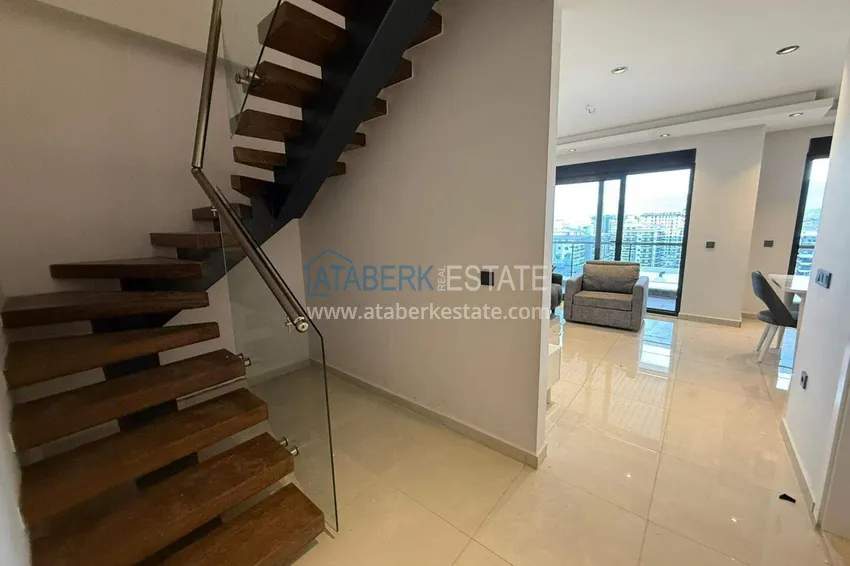 Purchase 2+1 duplex in Mahmutlar with furniture and sea and mountain views 7