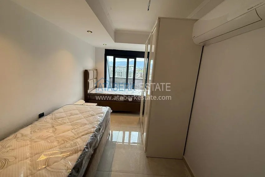 Purchase 2+1 duplex in Mahmutlar with furniture and sea and mountain views 9