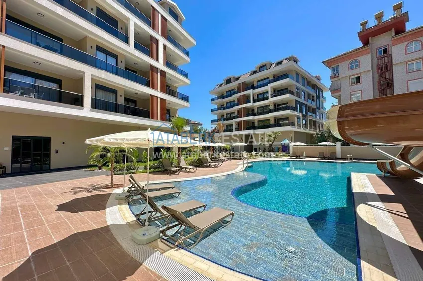 Three-room apartment in the center of Alanya - new property in a comfort-class residence 10
