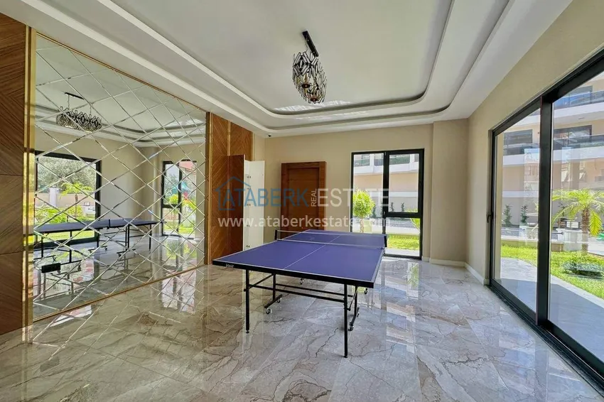 Three-room apartment in the center of Alanya - new property in a comfort-class residence 21