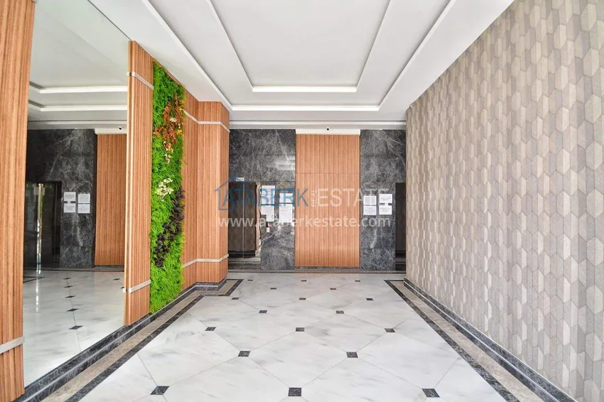 Квартира 1+1 57 м² с видом на море в Махмутларе - современный жилой комплекс 13