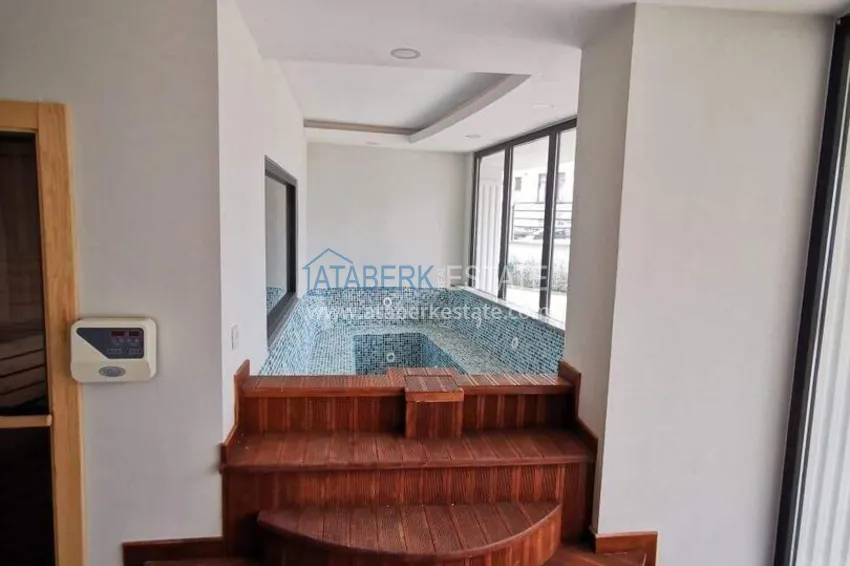 Apartment and penthouse in Tosmur - single price for two properties, 300 m from the sea 10 