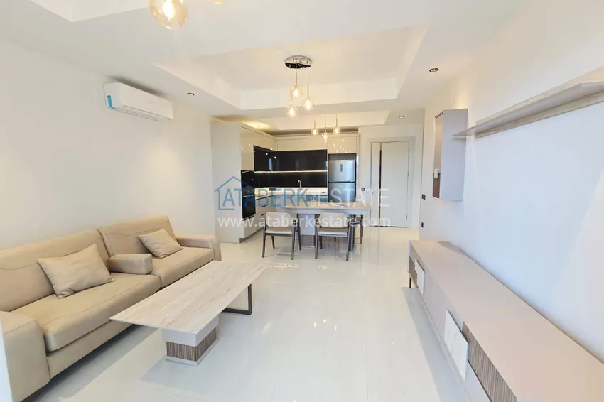 Purchase Spacious 1+1 apartment in Turkler — 80 m2 furnished by the owner, premium resort 10