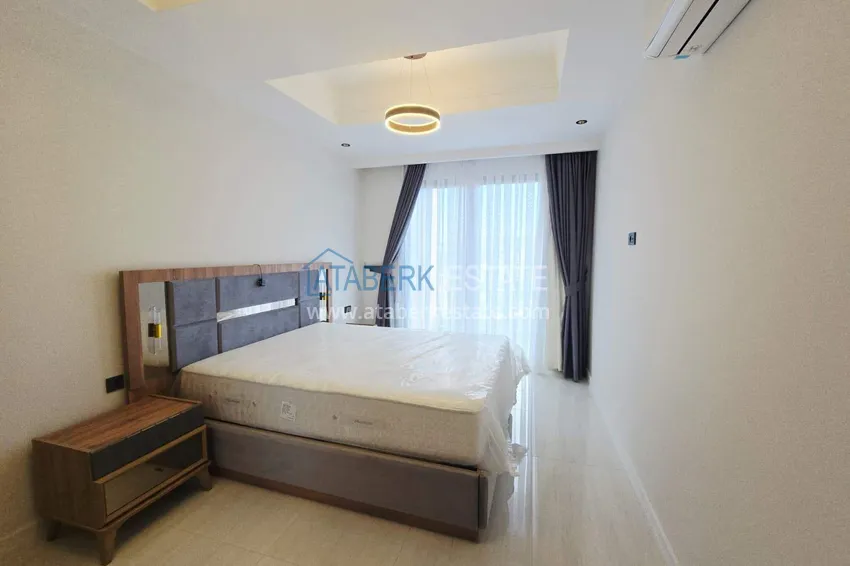 Purchase Spacious 1+1 apartment in Turkler — 80 m2 furnished by the owner, premium resort 11