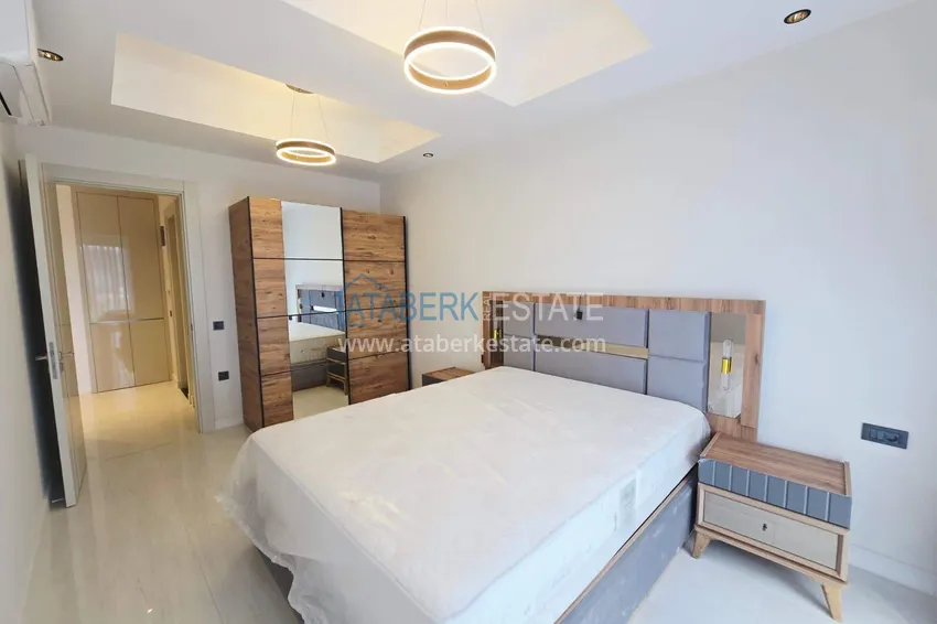 Purchase Spacious 1+1 apartment in Turkler — 80 m2 furnished by the owner, premium resort 12